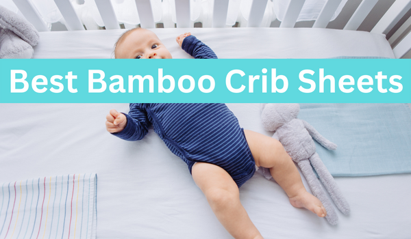 baby with blue nappy over the best bamboo crib sheets
